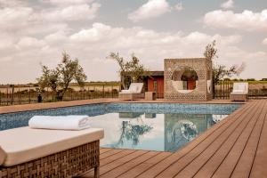 Bazén v ubytování Casa Raíces Hotel Luxury & Viñedo nebo v jeho okolí