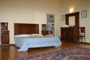Postel nebo postele na pokoji v ubytování Hotel Panorama Bologna Centro