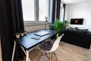 TV a/nebo společenská místnost v ubytování Marvlex #1 - Studio mit WIFI und NETFLIX