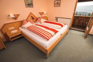Postel nebo postele na pokoji v ubytování Kolmsteiner Hof