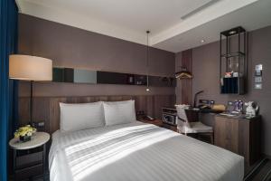 
A bed or beds in a room at Quarantine Hotel - WESTGATE Hotel

