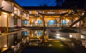 Fotografie z fotogalerie ubytování Yuanyan Heyuan Homestay v destinaci Kchun-ming
