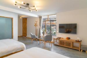Fotografie z fotogalerie ubytování Yuanyan Heyuan Homestay v destinaci Kchun-ming
