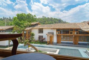 Fotografie z fotogalerie ubytování Yuanyan Heyuan Homestay v destinaci Kchun-ming