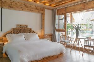 Fotografie z fotogalerie ubytování Yuanyan Heyuan Homestay v destinaci Kchun-ming