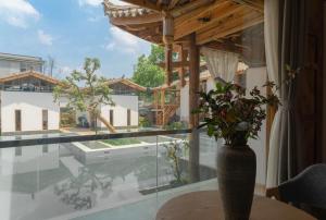Fotografie z fotogalerie ubytování Yuanyan Heyuan Homestay v destinaci Kchun-ming