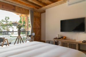 Fotografie z fotogalerie ubytování Yuanyan Heyuan Homestay v destinaci Kchun-ming