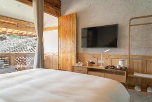 Fotografie z fotogalerie ubytování Yuanyan Heyuan Homestay v destinaci Kchun-ming
