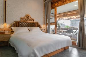 Fotografie z fotogalerie ubytování Yuanyan Heyuan Homestay v destinaci Kchun-ming