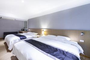 Postel nebo postele na pokoji v ubytování Stay Inn 2