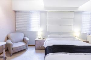 Postel nebo postele na pokoji v ubytování Stay Inn 2