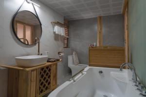 Fotografie z fotogalerie ubytování Yuanyan Heyuan Homestay v destinaci Kchun-ming