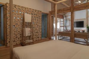Fotografie z fotogalerie ubytování Yuanyan Heyuan Homestay v destinaci Kchun-ming