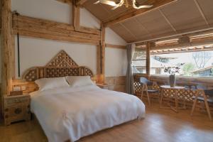 Fotografie z fotogalerie ubytování Yuanyan Heyuan Homestay v destinaci Kchun-ming