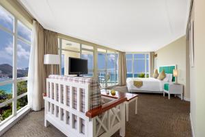 TV a/nebo společenská místnost v ubytování Sunshine Resort Intime Sanya