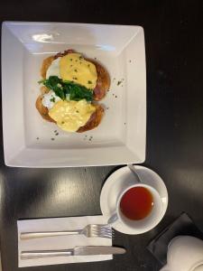 a plate of food and a cup of tea at No12 Hotel in North Berwick