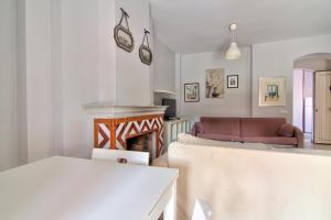 Posteľ alebo postele v izbe v ubytovaní Apartamentos Aloha2 El Puerto de Santa Maria
