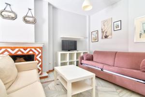 Televízia a/alebo spoločenská miestnosť v ubytovaní Apartamentos Aloha2 El Puerto de Santa Maria