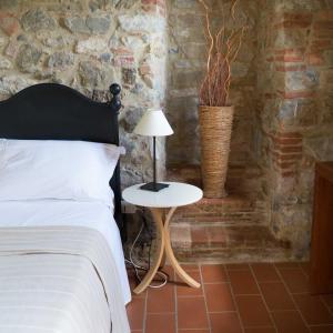 Postel nebo postele na pokoji v ubytování Agriturismo Le Valli