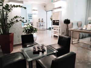 TV a/nebo společenská místnost v ubytování Hotel Porta Felice & Spa
