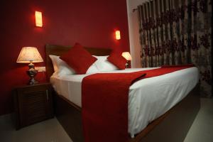 Katil atau katil-katil dalam bilik di Hotel Travellers Nest Kandy