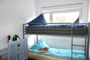 Postel nebo postele na pokoji v ubytování Motel Home Berlin