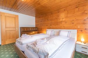 Ένα ή περισσότερα κρεβάτια σε δωμάτιο στο Chalet Weid - Aare Jungfrau AG