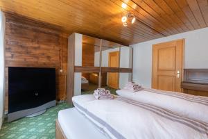 Ένα ή περισσότερα κρεβάτια σε δωμάτιο στο Chalet Weid - Aare Jungfrau AG
