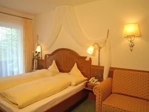 Postel nebo postele na pokoji v ubytování Hotel Hagerhof + 10 fotografií