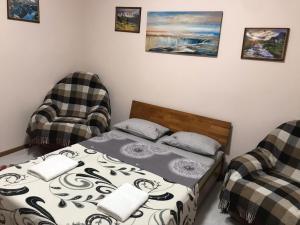 Ένα ή περισσότερα κρεβάτια σε δωμάτιο στο Two-bedroom apartment in 10 min to the Opera Theatre