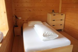 Voodi või voodid majutusasutuse Ospizio San Gottardo toas
