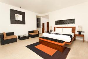 Ένα ή περισσότερα κρεβάτια σε δωμάτιο στο Aliya Resort and Spa - Thema Collection