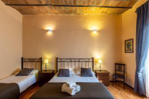 Кровать или кровати в номере Roma family apartment