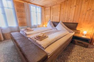 Ένα ή περισσότερα κρεβάτια σε δωμάτιο στο Chalet Weid - Aare Jungfrau AG