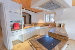 Η κουζίνα ή μικρή κουζίνα στο Chalet Weid - Aare Jungfrau AG
