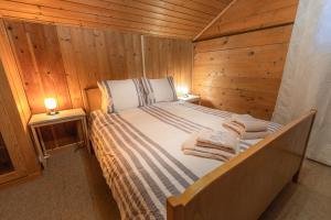 Ένα ή περισσότερα κρεβάτια σε δωμάτιο στο Chalet Weid - Aare Jungfrau AG