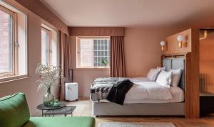 a bedroom with a bed and a window at Whitworth Locke in Manchester