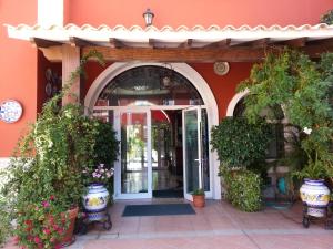 Fachada o entrada de Hotel Romerito