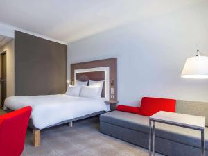Posteľ alebo postele v izbe v ubytovaní Novotel Katowice Centrum