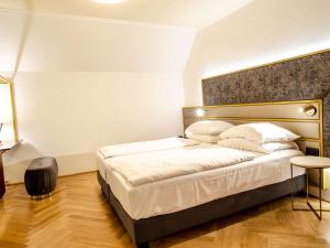 Letto o letti in una camera di Hotel Secession an der Oper