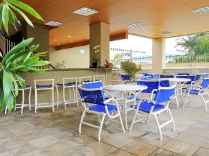 Un restaurant u otro lugar para comer en Mercure Jaragua do Sul