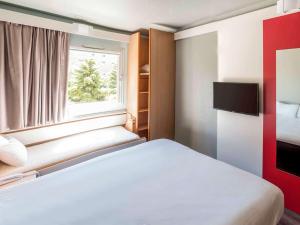 Postel nebo postele na pokoji v ubytování Ibis Salamanca