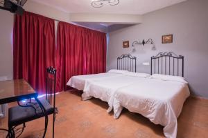 Cama o camas de una habitación en Santa Cruz