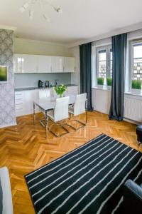 Kuchyňa alebo kuchynka v ubytovaní Cracovia Apartments