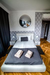 Posteľ alebo postele v izbe v ubytovaní Cracovia Apartments