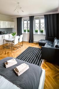Posedenie v ubytovaní Cracovia Apartments