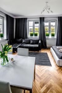 Posedenie v ubytovaní Cracovia Apartments