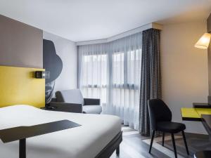 Postel nebo postele na pokoji v ubytování Ibis Styles Nice Centre Port