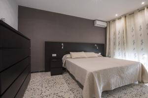 Postel nebo postele na pokoji v ubytování R54 Apartamento MONTSERRAT 11-2