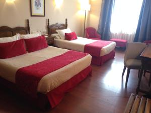 Een bed of bedden in een kamer bij Hotel Pazo O Rial